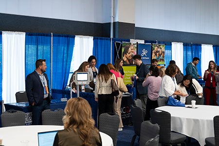 Accelerating Health Equity Conference - Exhibitors talking with conference attendees