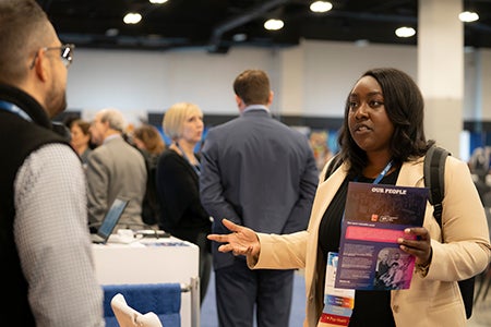 Accelerating Health Equity Conference - Exhibitors talking with conference attendees