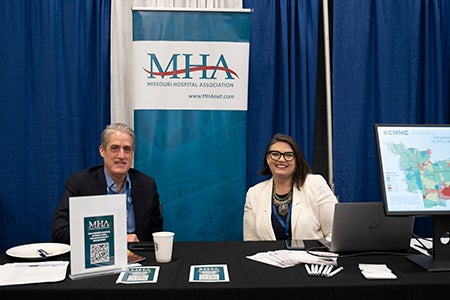 Accelerating Health Equity Conference - Exhibitors talking with conference attendees